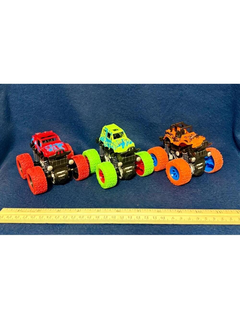 Mixed lot of 3 toy monster trucks